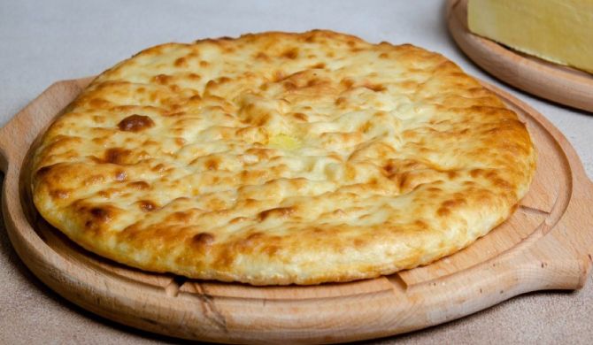 Осетинские пироги с творогом, сыром и зеленью на сковороде рецепт