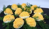 Фаршированные яйца с тунцом и сыром на праздничный стол